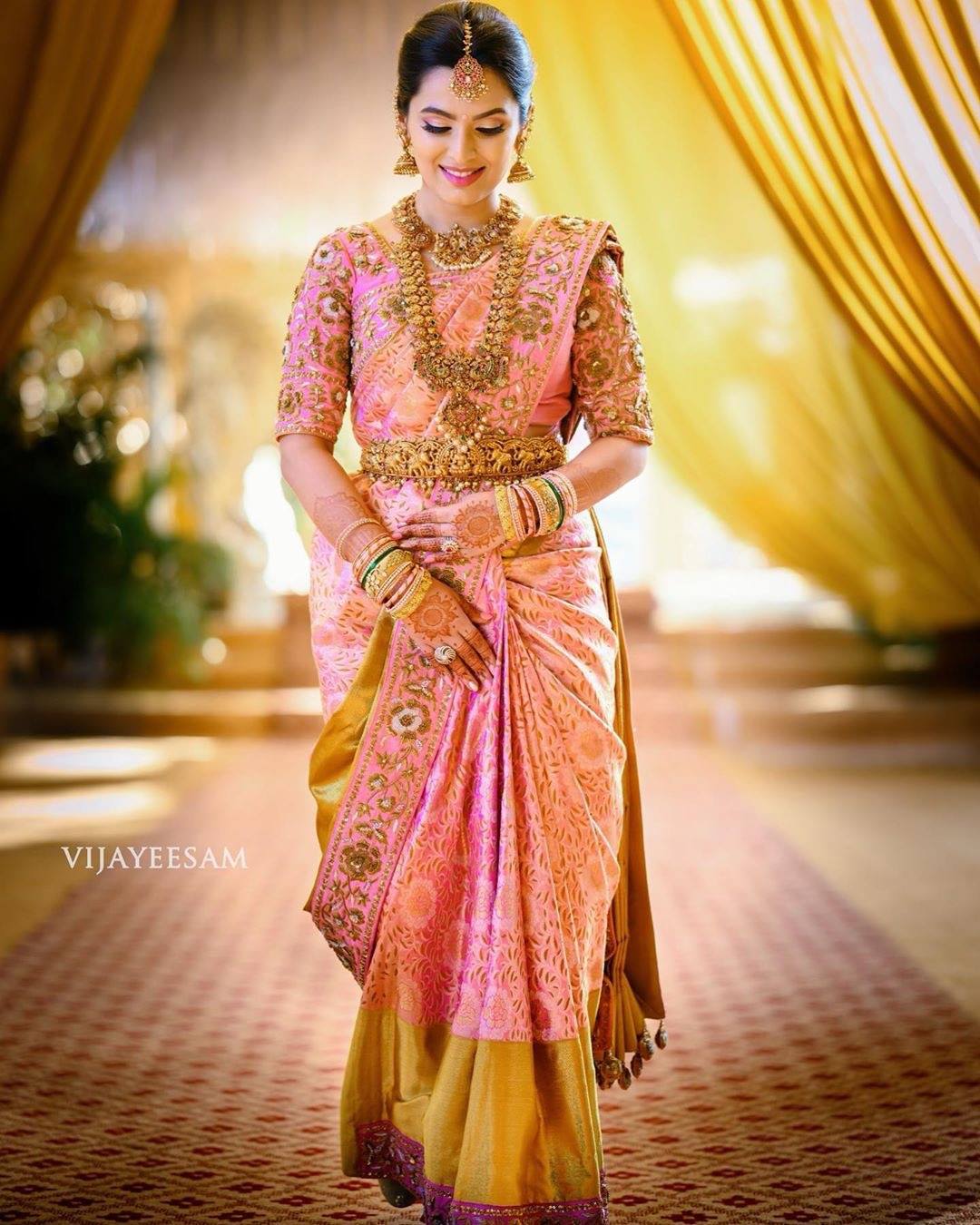 pastel pink south ndian wedding saree 