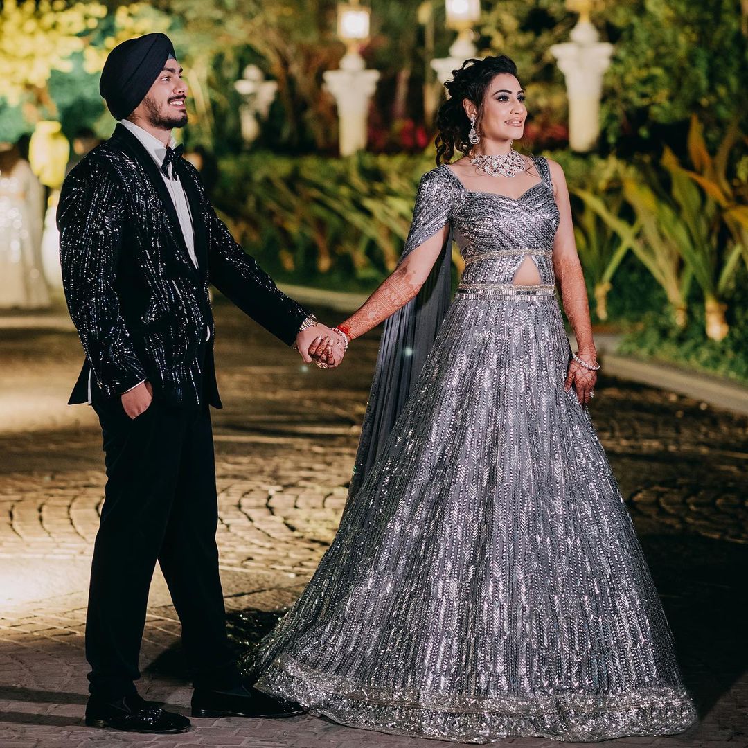 Designer silver Manish Malhotra engagement dress for bride