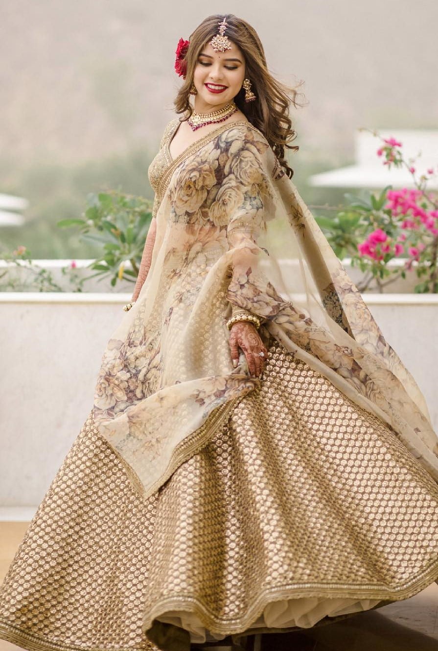 Sabyasachi engagement lehenga look in golden ring ceremony dress