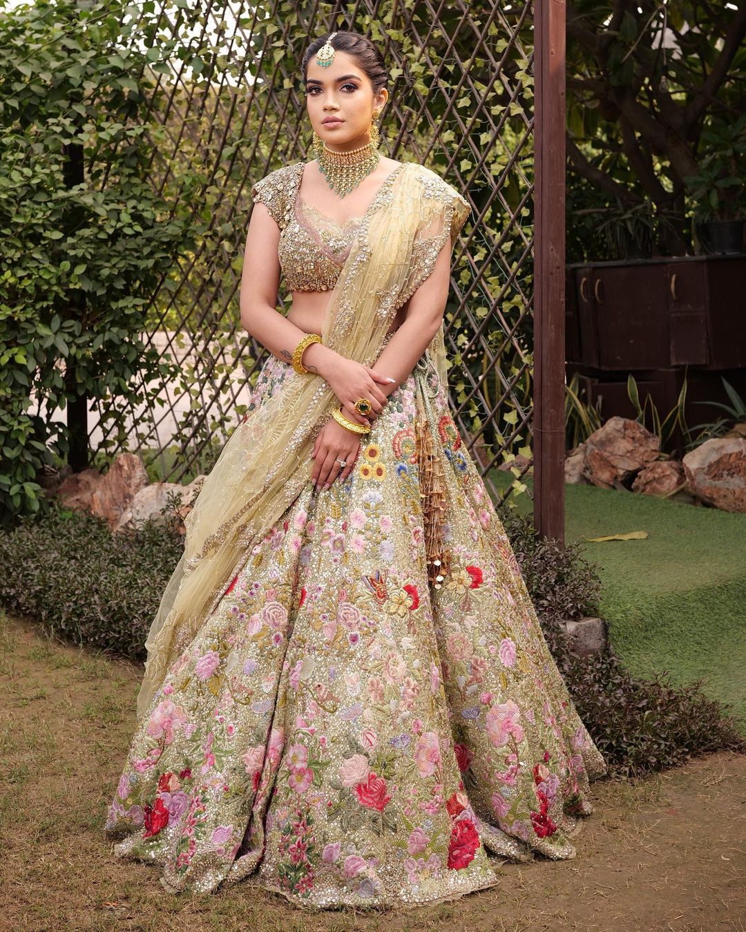 engagement look for bride in beige embroidered lehenga