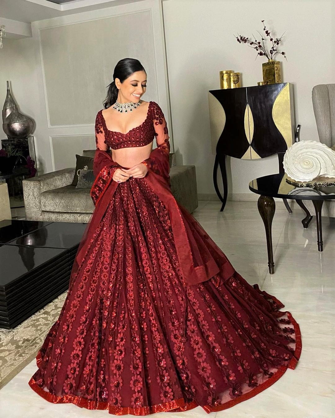 designer maroon reception lehenga with floral motifs