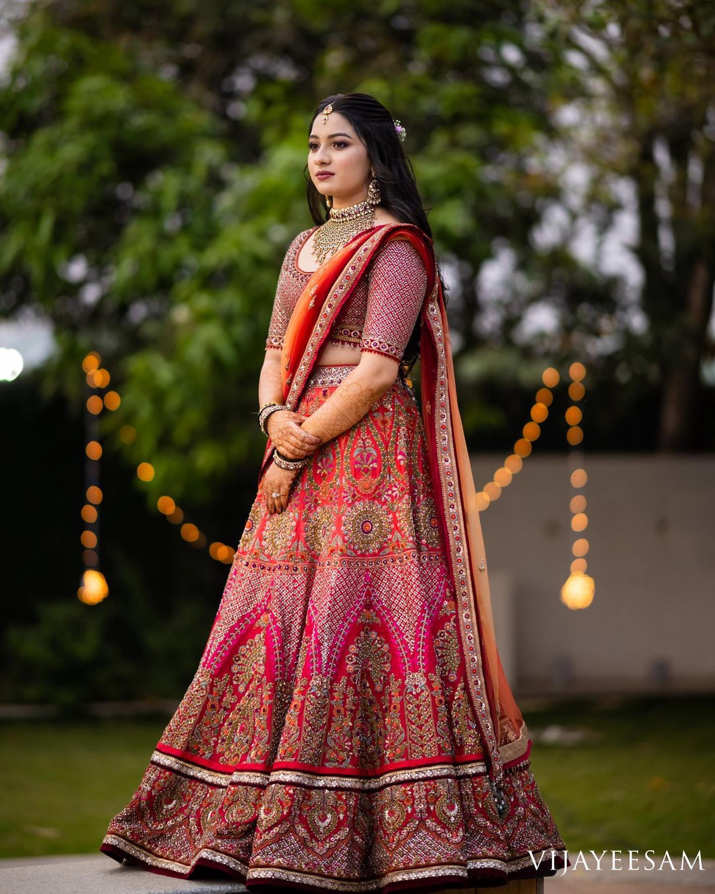reception look for bride in red lehenga