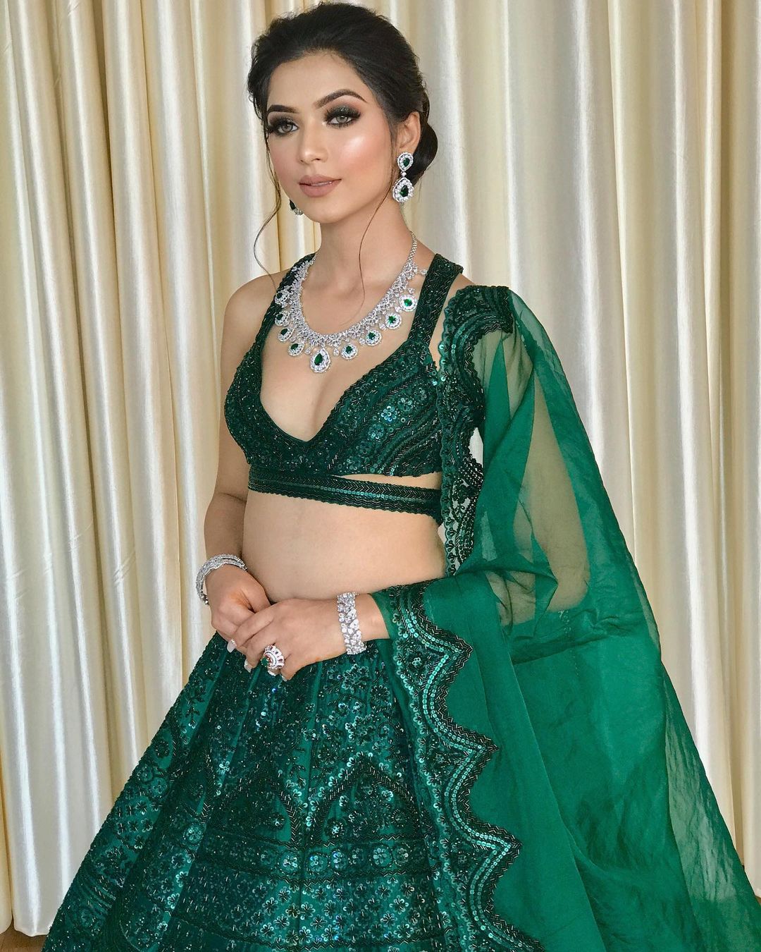 latest dark green lehenga reception look