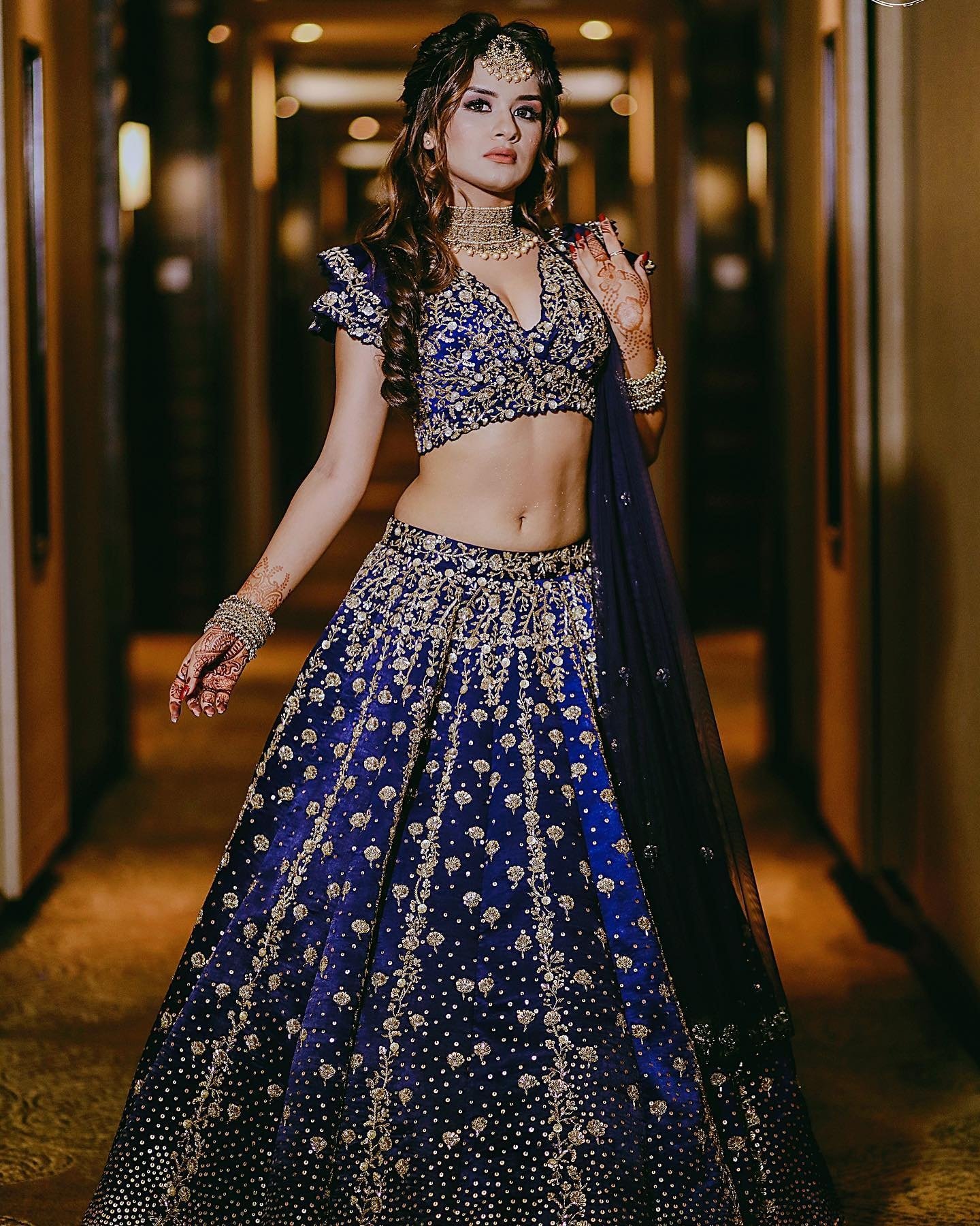 bollywood celebrity golden and royal blue lehenga for wedding party 