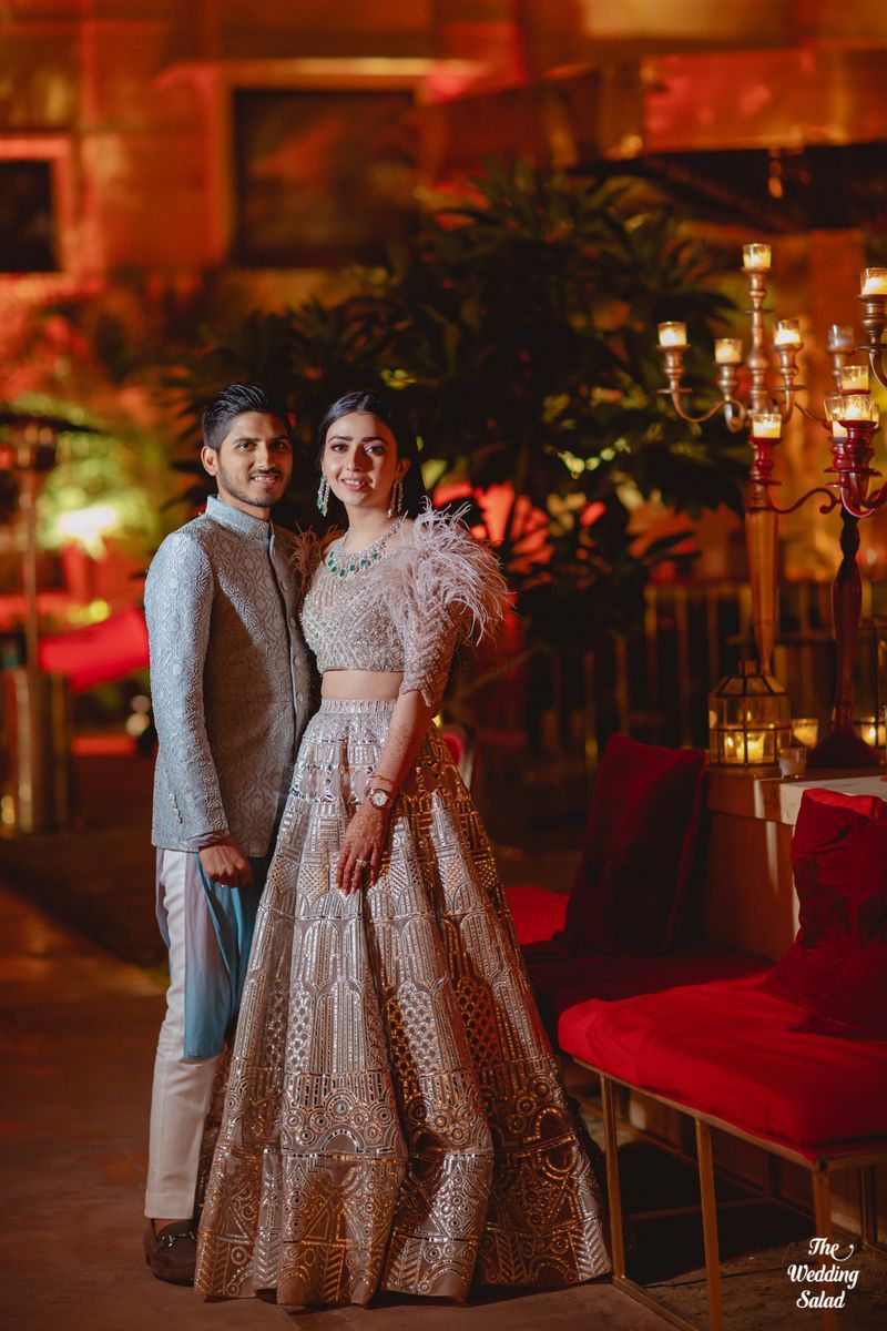 silver lehenga with feather blouse for sangeet