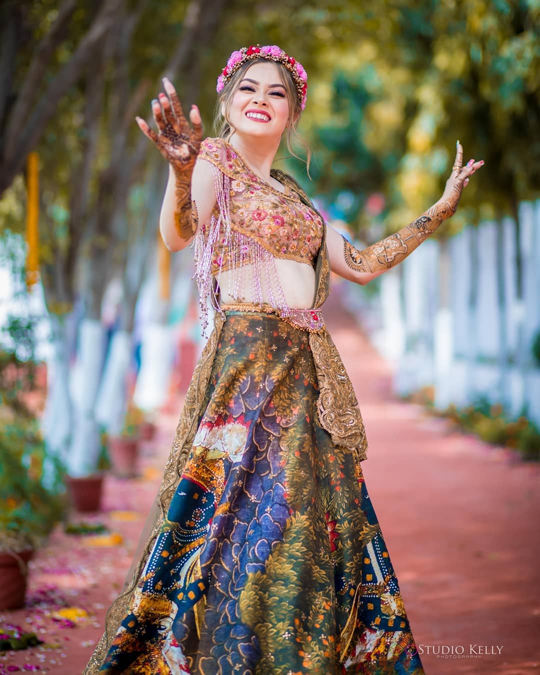 dancing bride on her mehndi function
