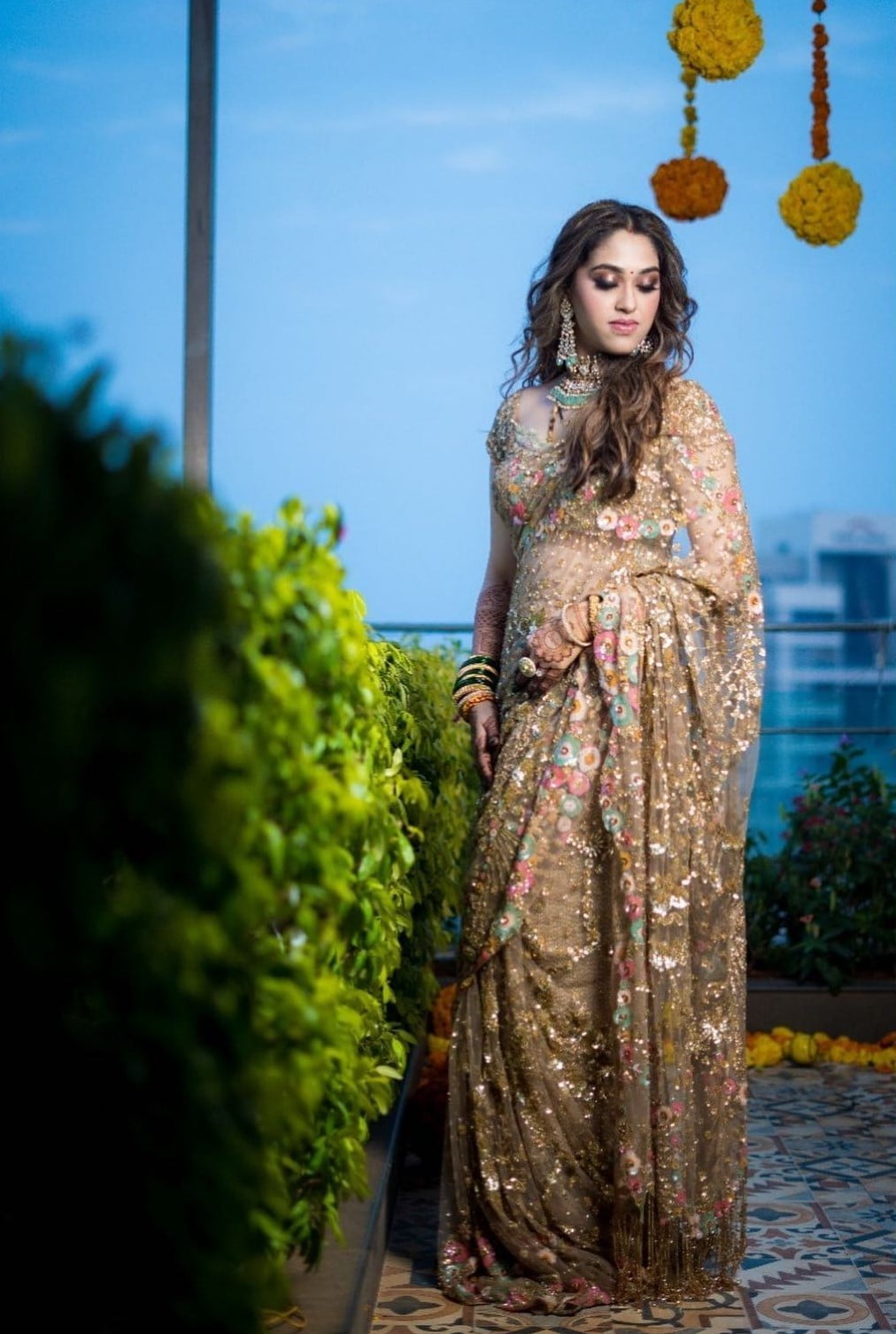 modern golden sequin reception saree for bride