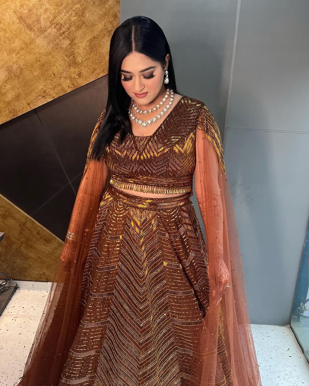 bronze lehenga with cape dupatta engagement dress for bride