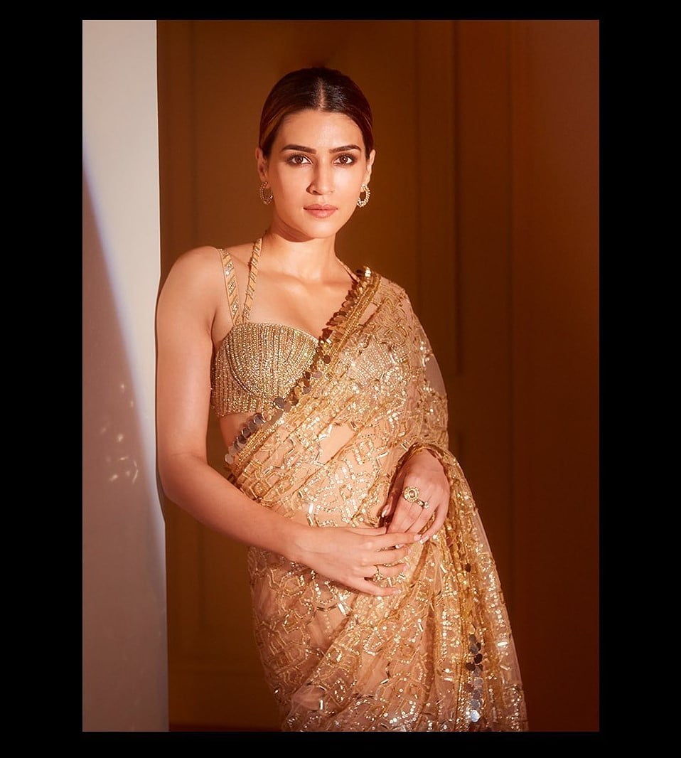 manish malhotra gold sequin saree for reception