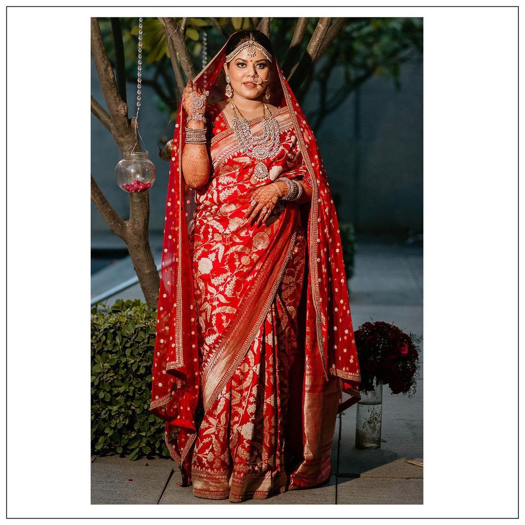 red and golden sabyasachi saree for bride