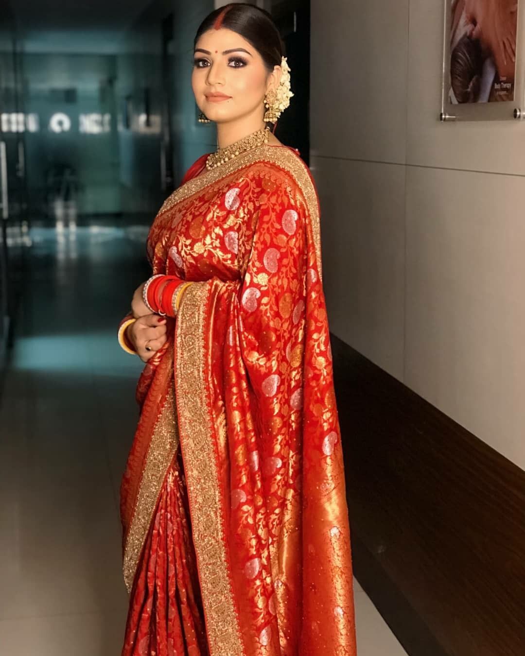 red reception banarasi saree from sabyasachi