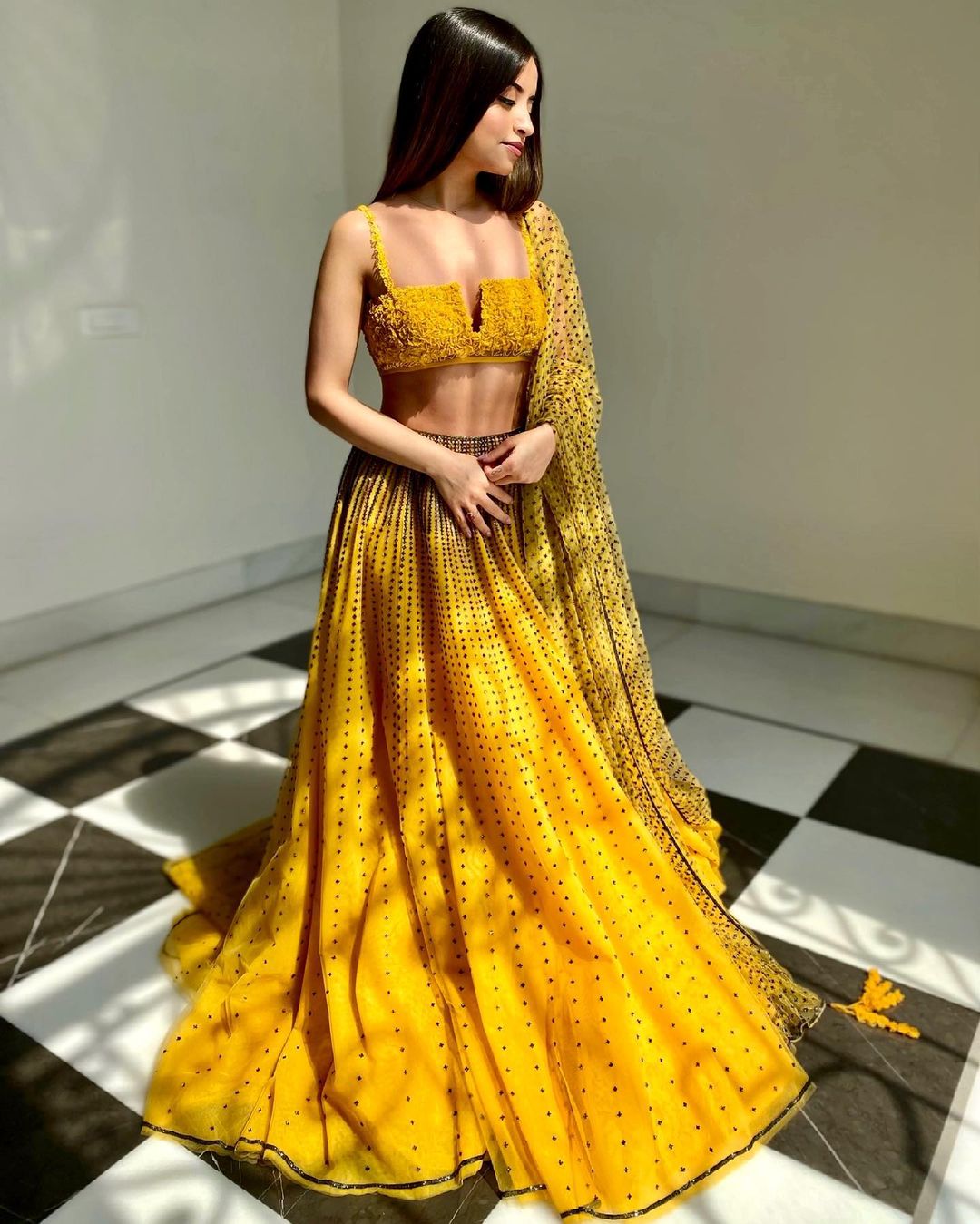 black and yellow designer lehenga choli for haldi bride