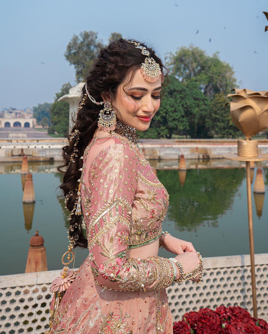 bridal front braid hairstyle for lehenga