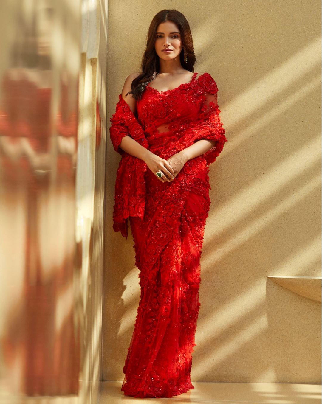 fancy net red saree with floral detail
