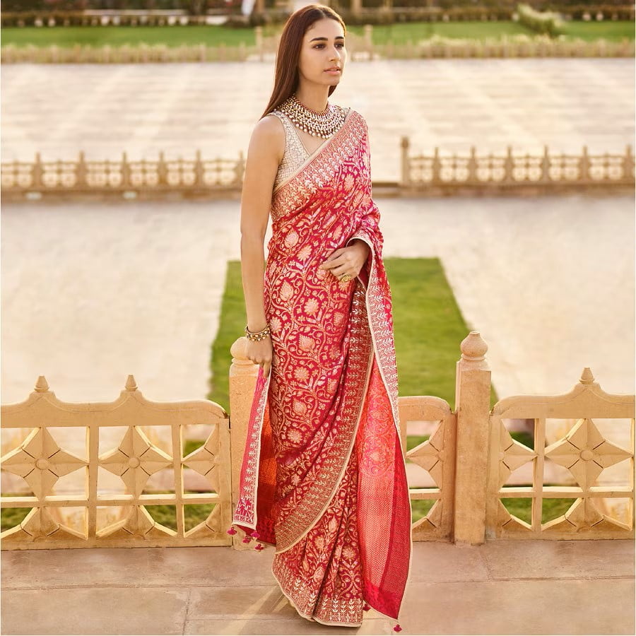 designer pink silk saree with silver zari for reception for bride 