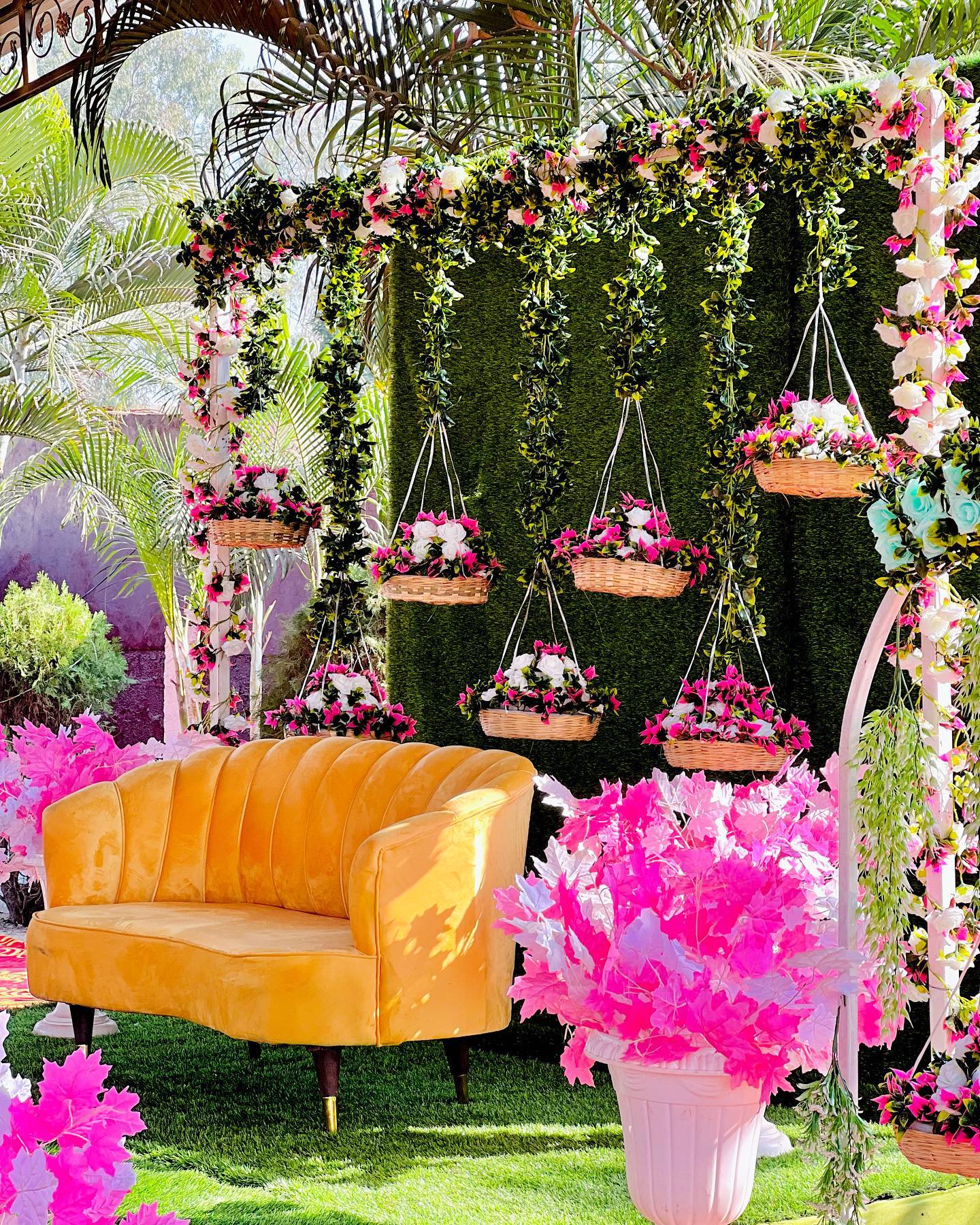 flower basket decoration for haldi backdrop with pink and white blooms