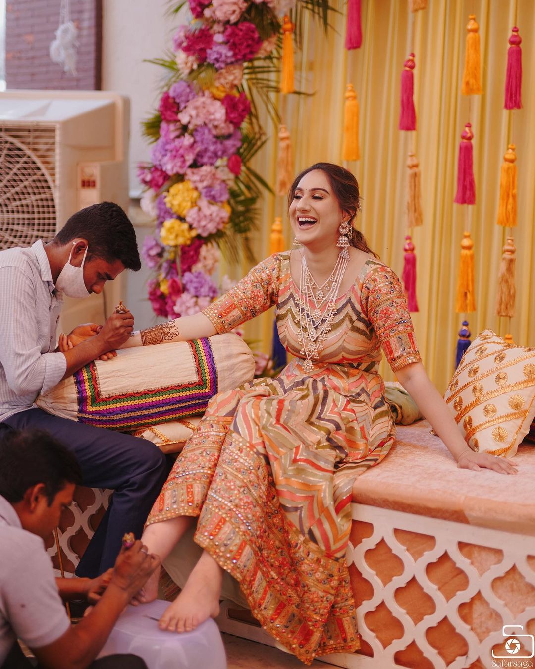 candid getting ready mehndi pose for bride