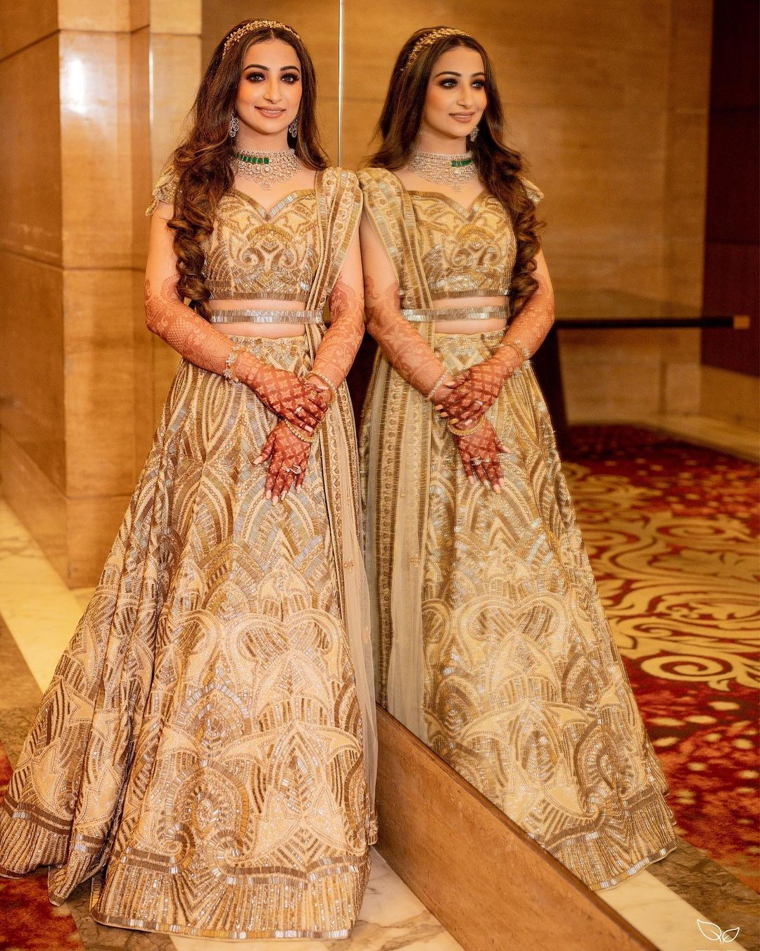 bride in shimmery golden ring ceremony lehenga