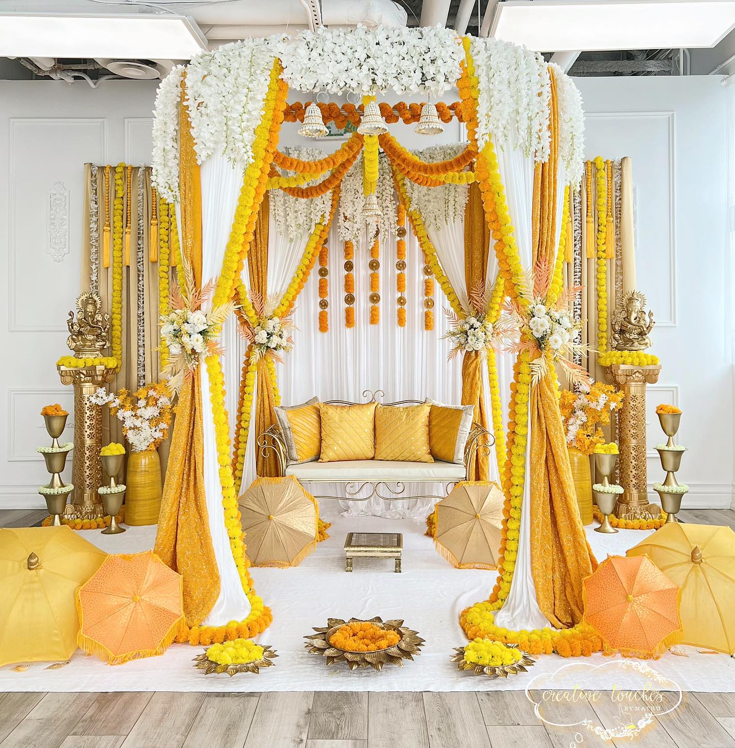yellow and white theme haldi decoration at home for bride and groom