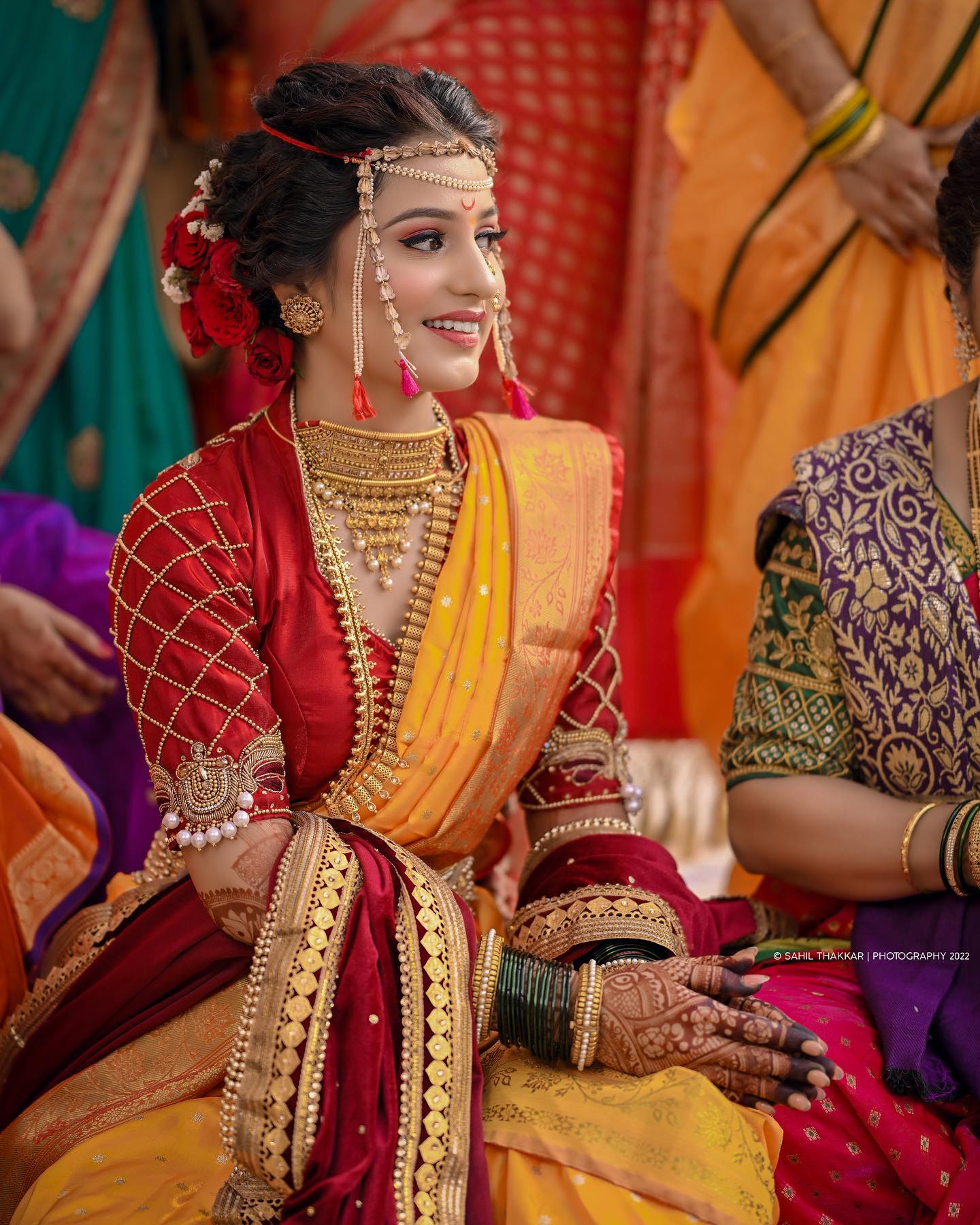 marathi bride in red and yellow saree on haldi