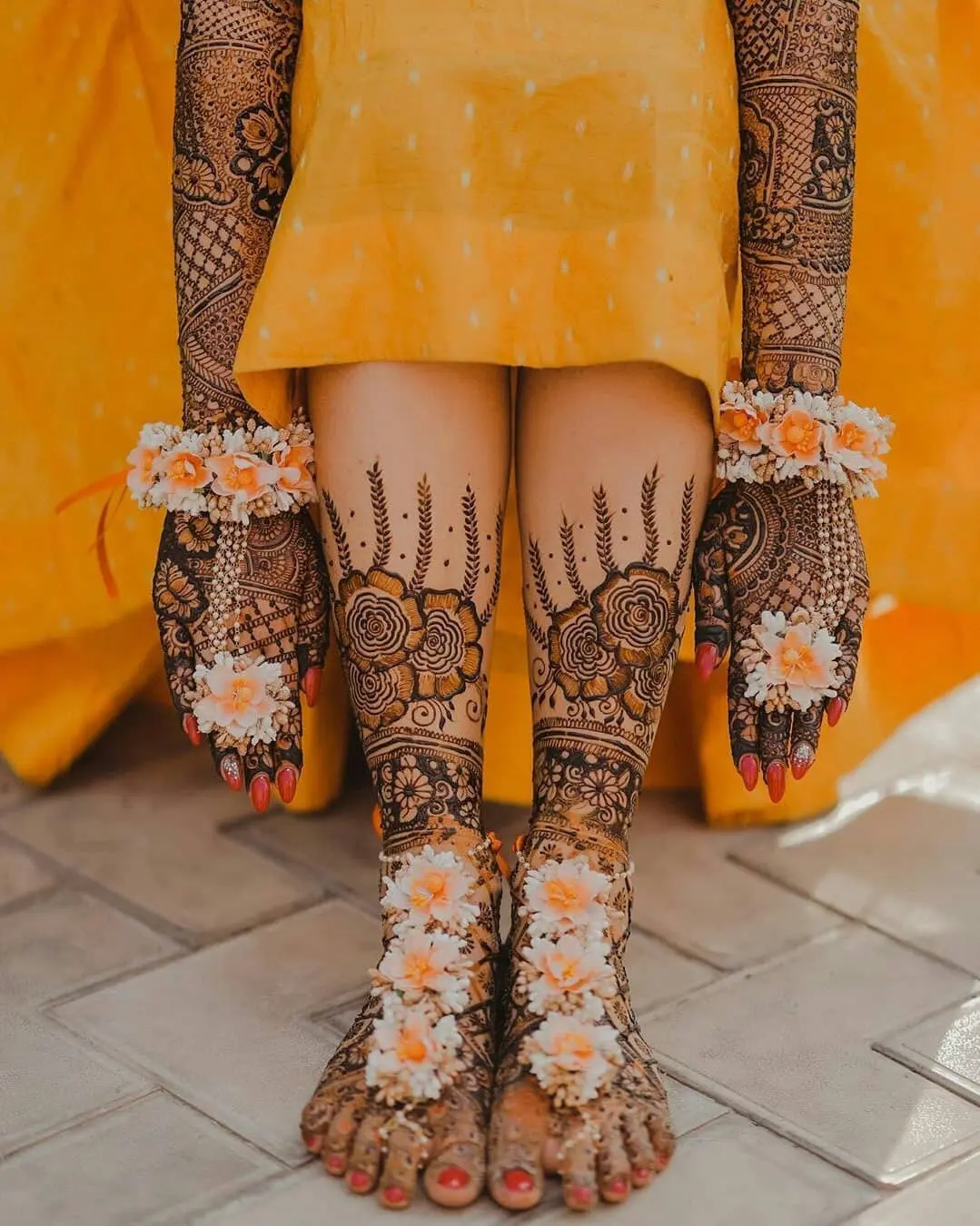 bridal hand and feet mehndi pose