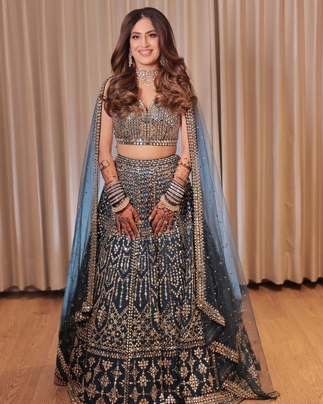 heavy blue mirror reception lehenga dress for bride