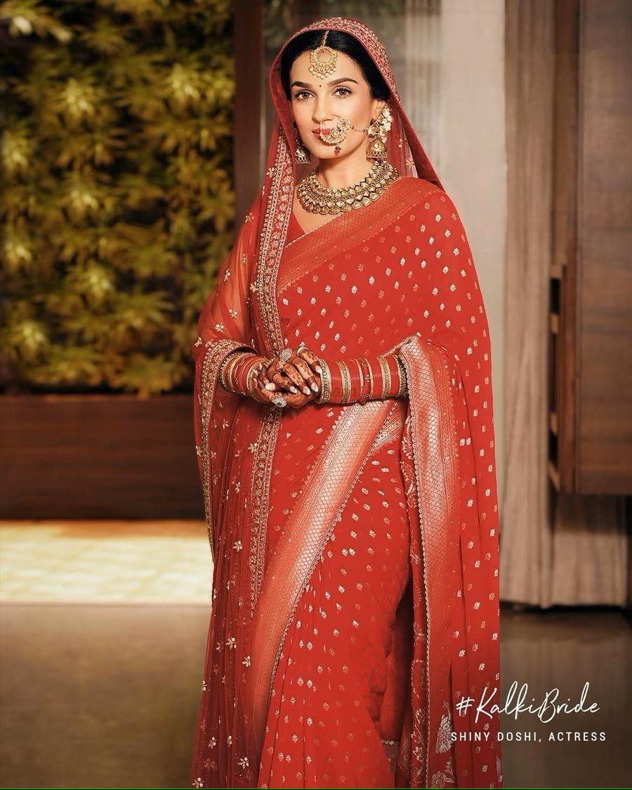 kalki fashion red saree with gota work and heavy border