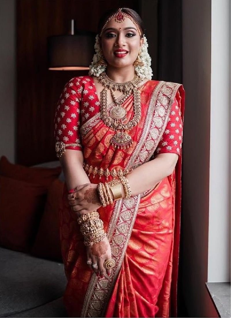 red bridal kanjivaram saree with intricate pallu for wedding