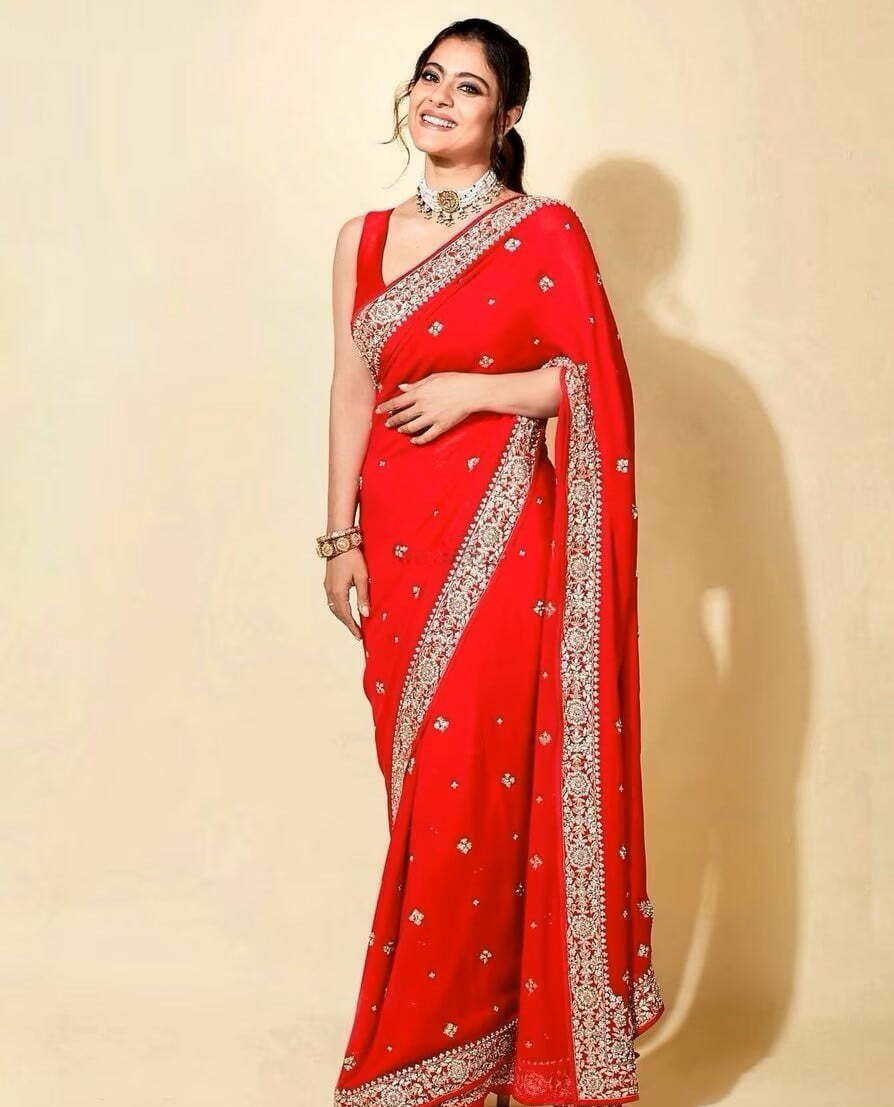celebrity red bridal saree with embellished border