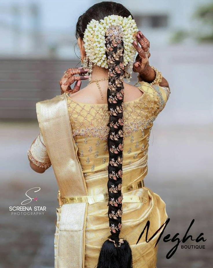 traditional jada hairstyle on south indian saree