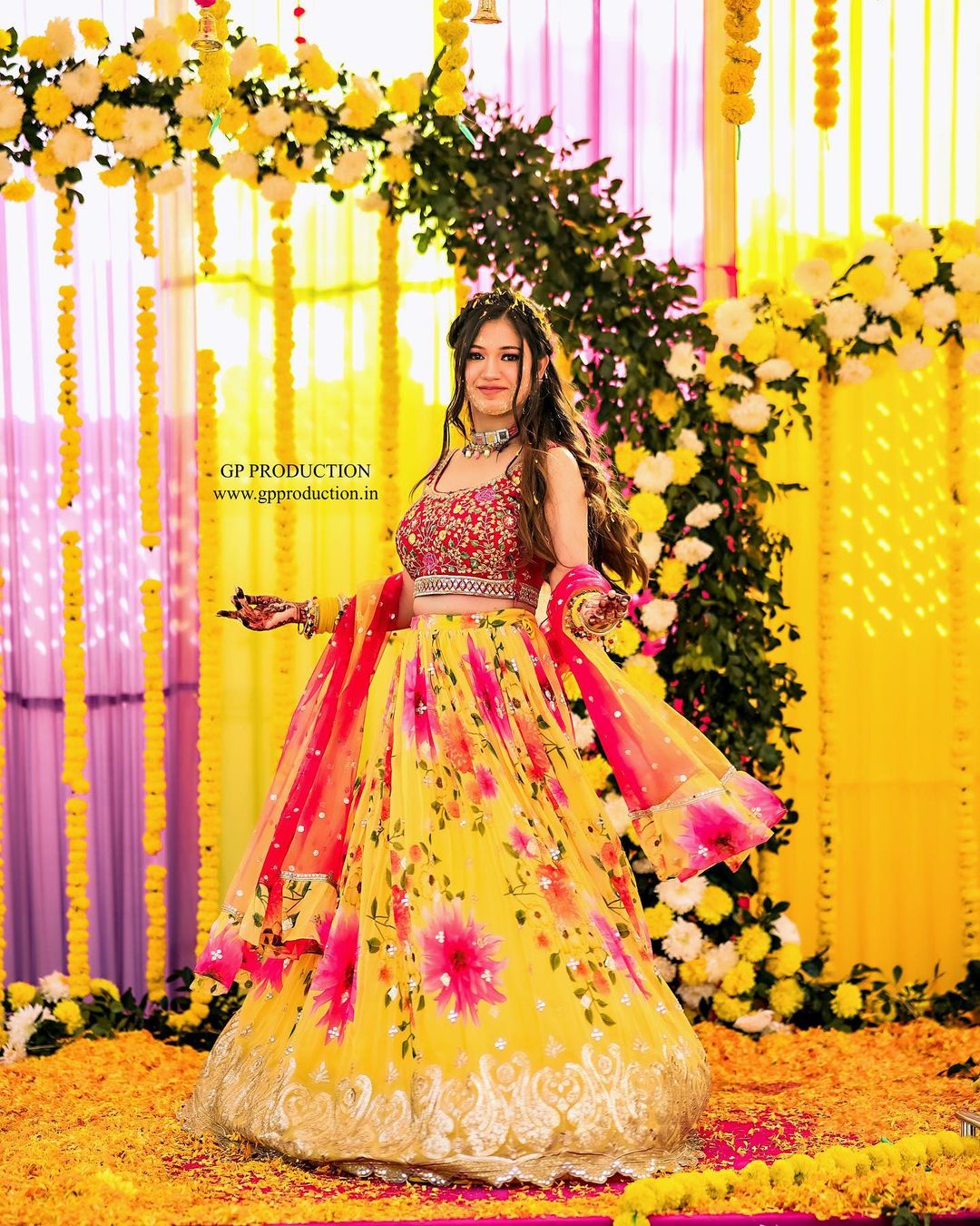 haldi look for bride in red and yellow floral lehenga choli