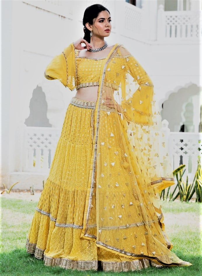 yellow lehenga with modern statement blouse for haldi