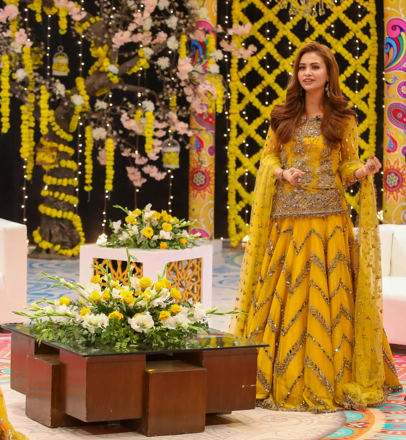 bride in beautiful yellow sharara suit 