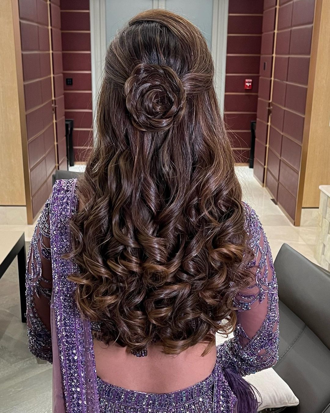 boho curls hairstyle for reception for lehenga