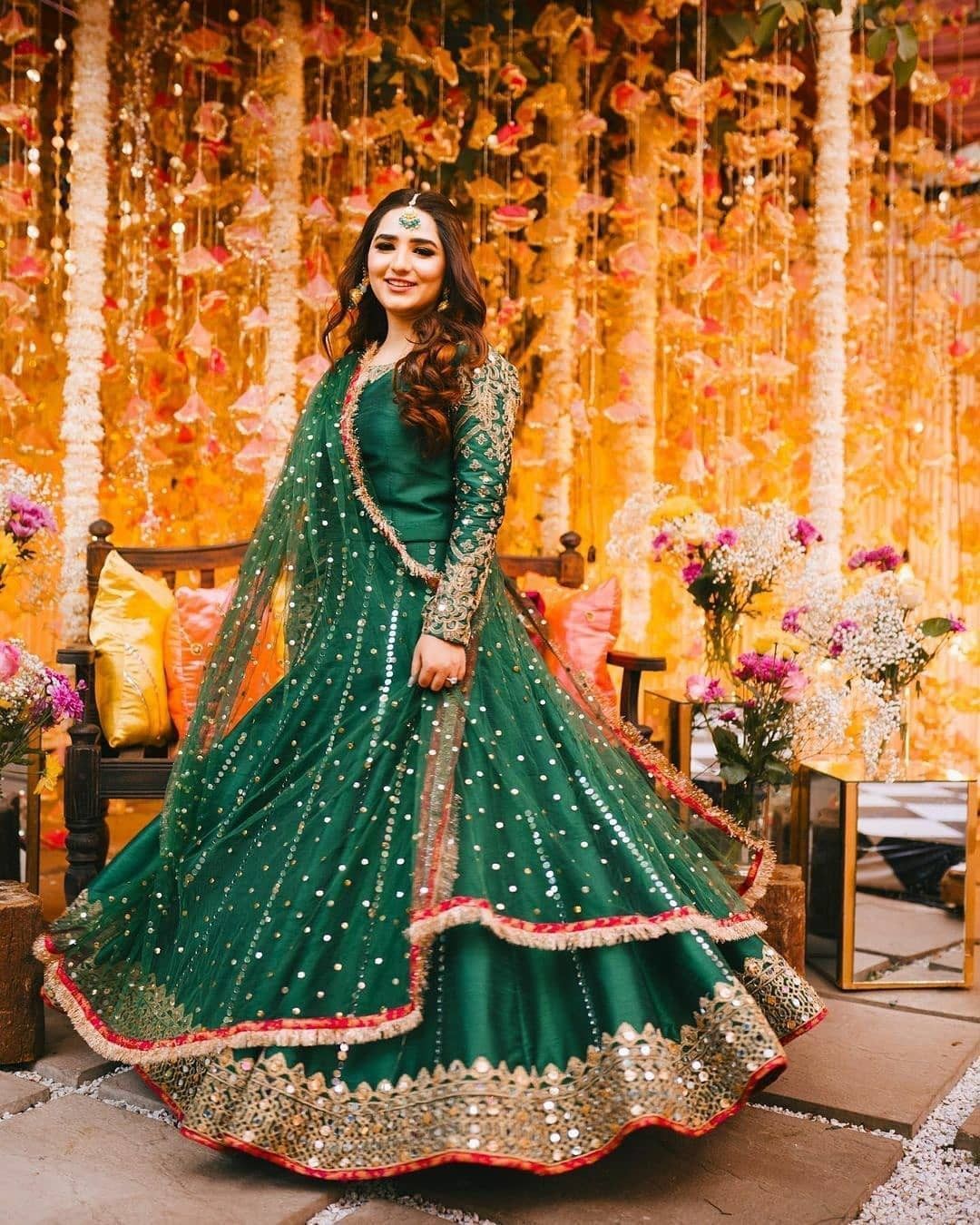 bottle green lehenga choli with golden embellished border