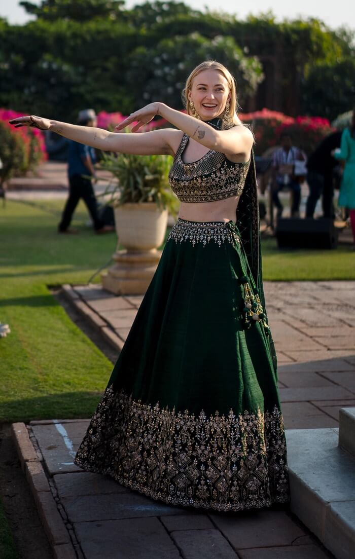 dark green silk lehenga choli for mehndi function for bride