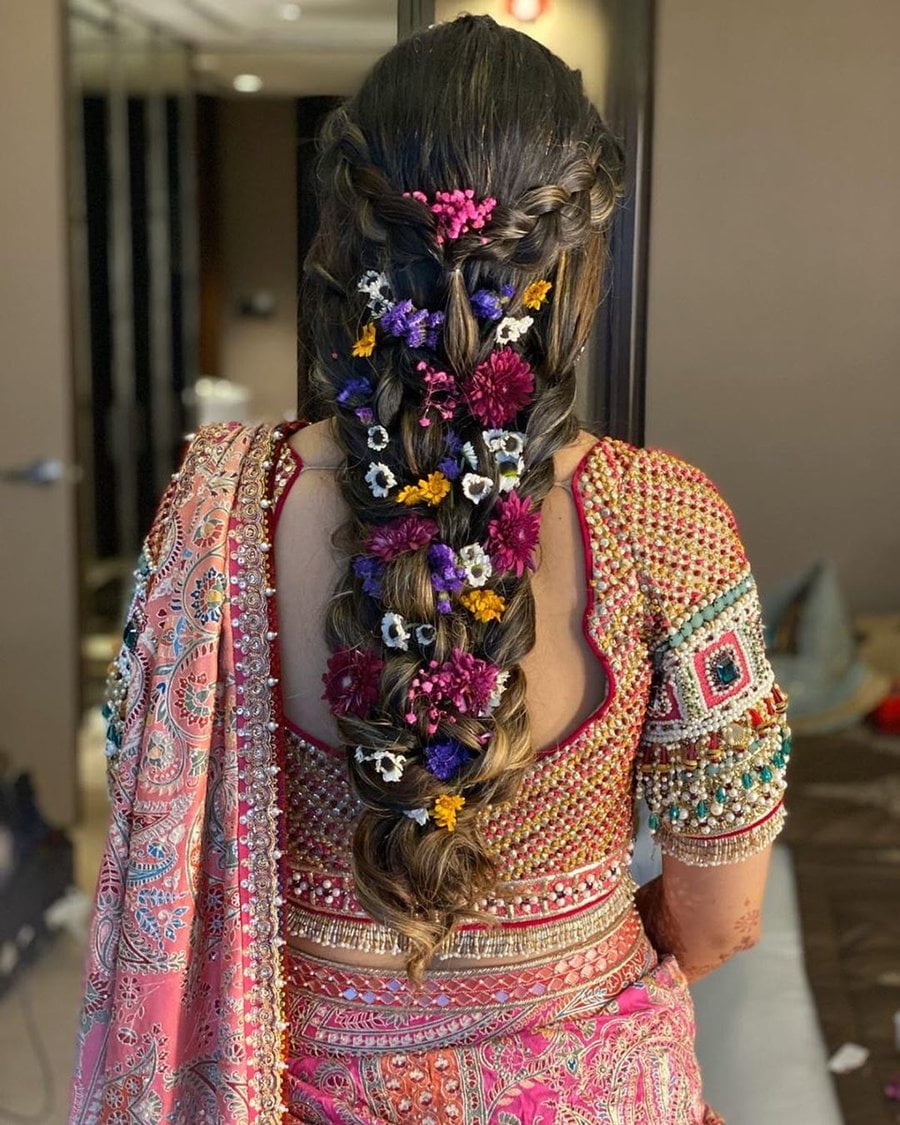 messy braid accented with real flowers