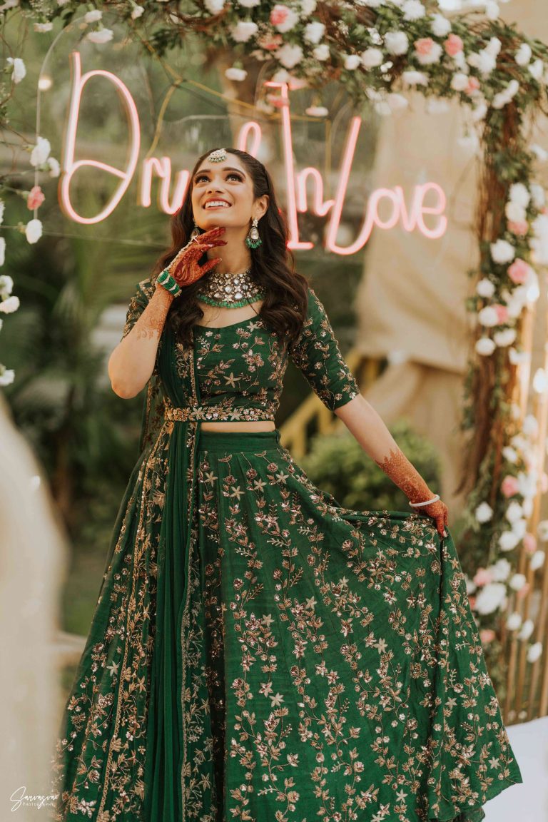 best green mehndi outfit for bride with floral embroidery 