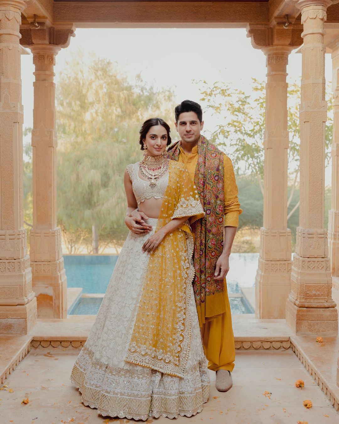 kiara advani white chikankari lehenga with yellow dupatta