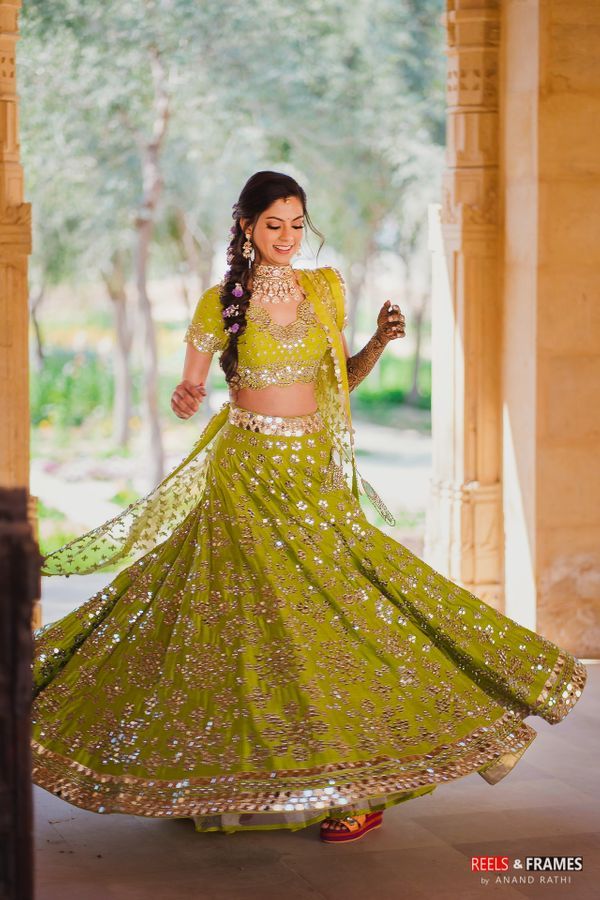 mehndi lehenga dress for bride with mirror embellishments 