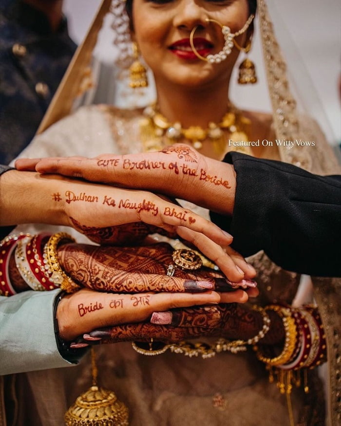 mehndi pose for bride with family