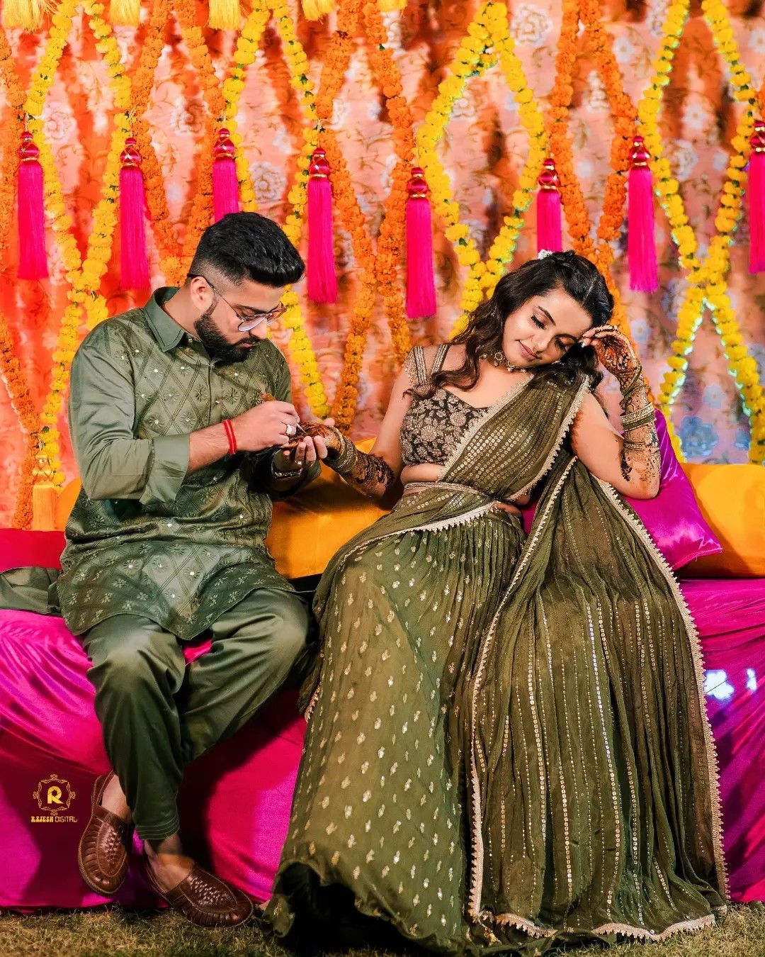 fun mehndi pose for bride with groom