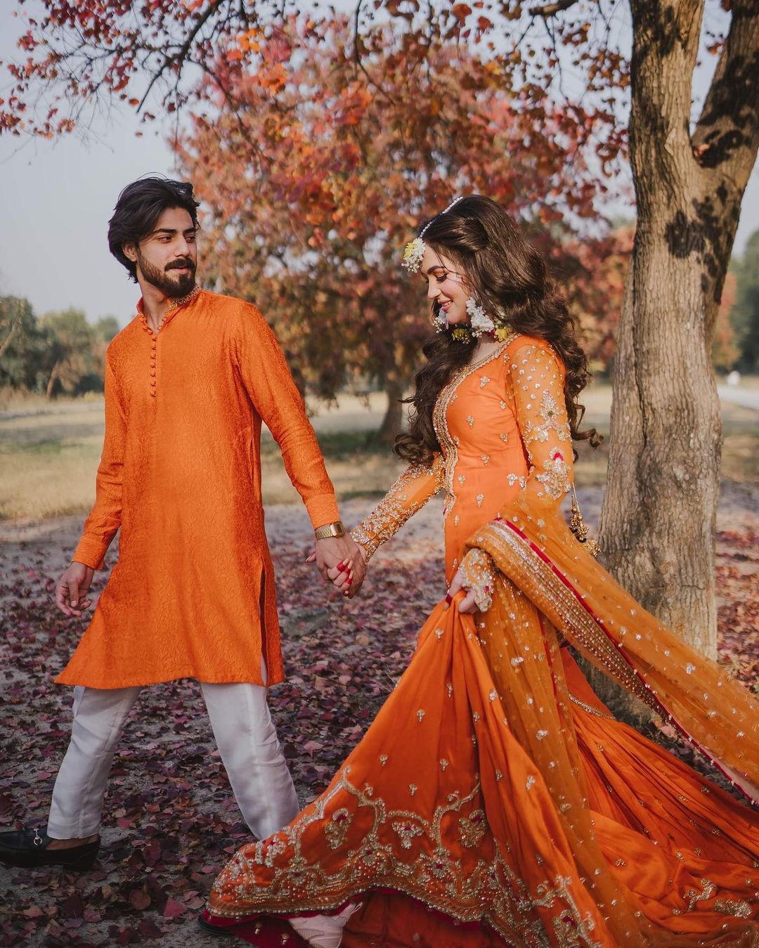 bright orange bridal gharara suit for mehendi