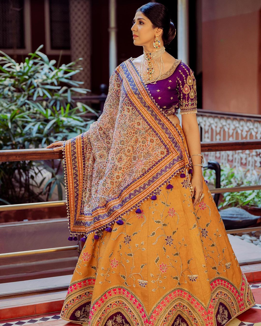 designer yellow and purple embroidered lehenga choli