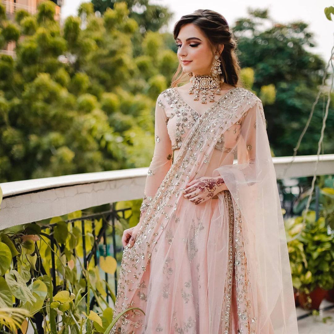 light peach lehenga engagement dress for bride