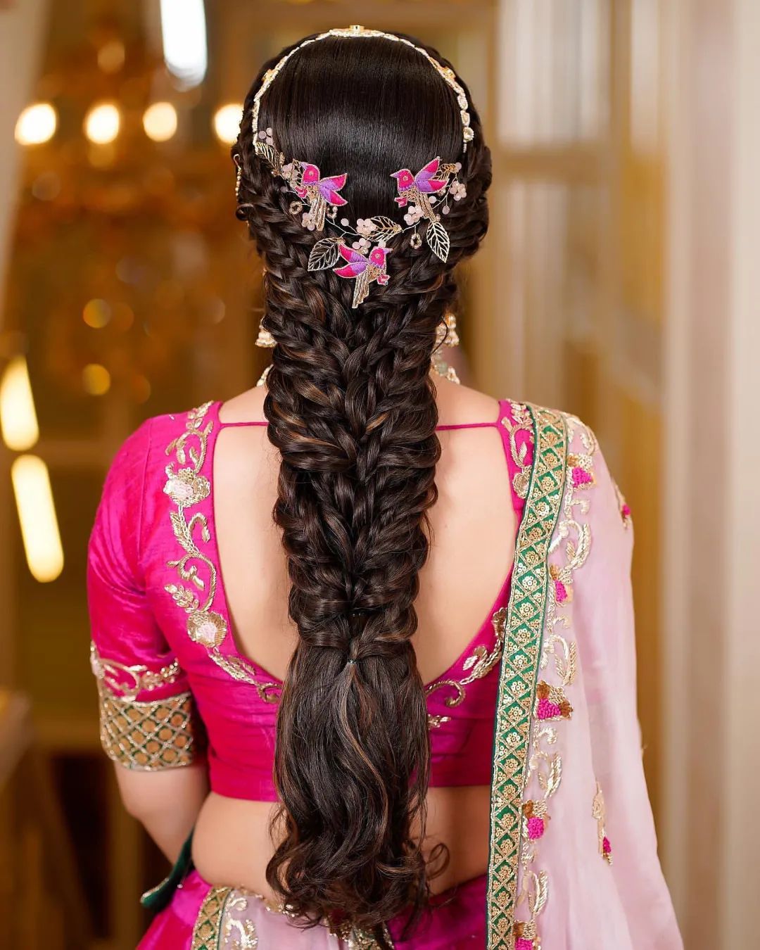 unique and quirky messy fishtail braid hairdo for south indian engagement 