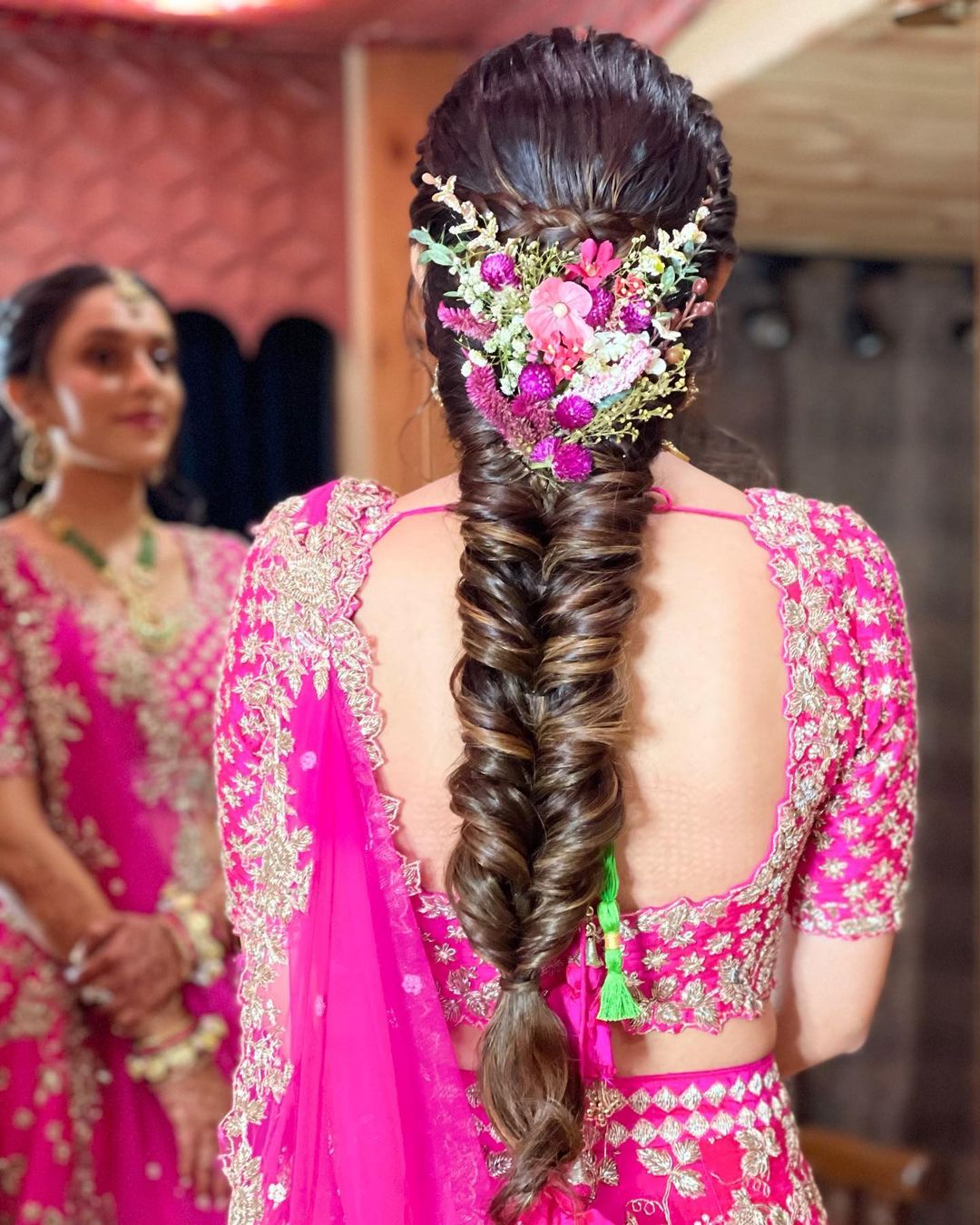 fishtail braid south indian engagement and wedding hairstyle