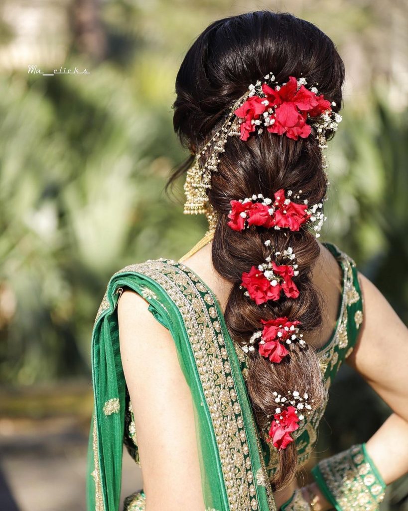 bubble braid reception bridal hairstyle for lehenga