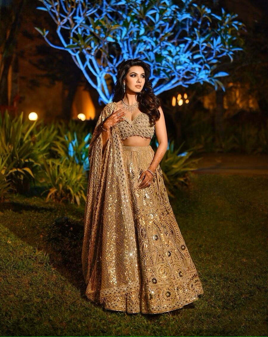 trendy and modern golden reception lehenga look 