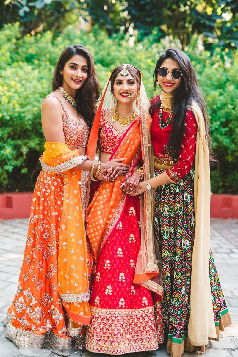orange and yellow ndian bridesmaid dresses for haldi and mehndi